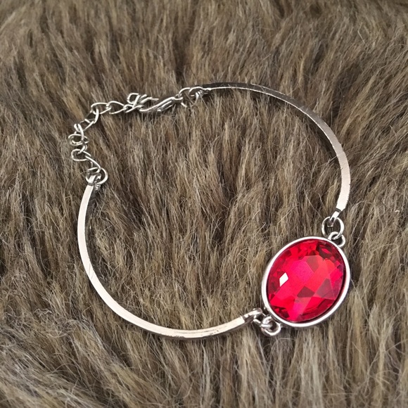 Silver tone faceted oval cut faux ruby bracelet - Picture 5 of 7